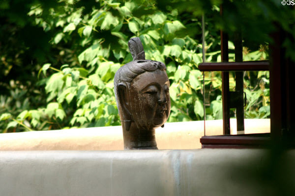 Sculpted oriental head at Fallingwater. Mill Run, PA.