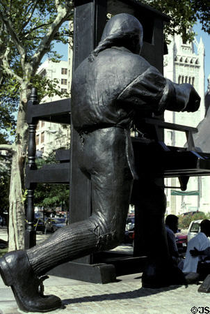Ben Franklin at Craftsman Printing Press Monument (1981) by Joe Brown on Penn Square. Philadelphia, PA.