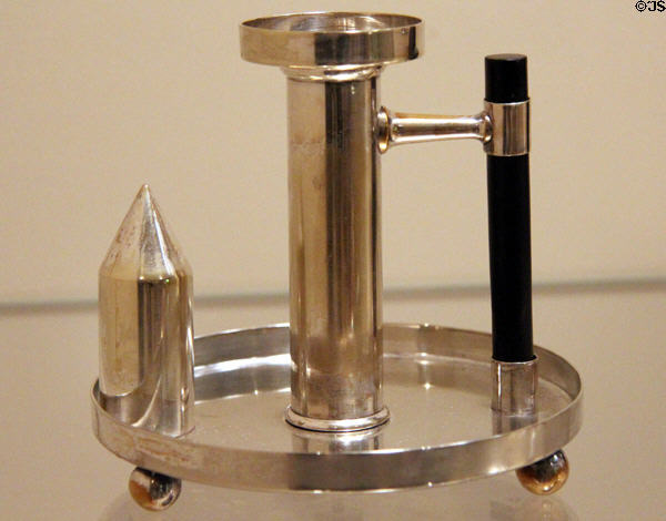 Electroplated brass chamber candlestick (c1882) by Christopher Dresser & made by Hukin & Heath of Birmingham, England at Carnegie Museum of Art. Pittsburgh, PA.