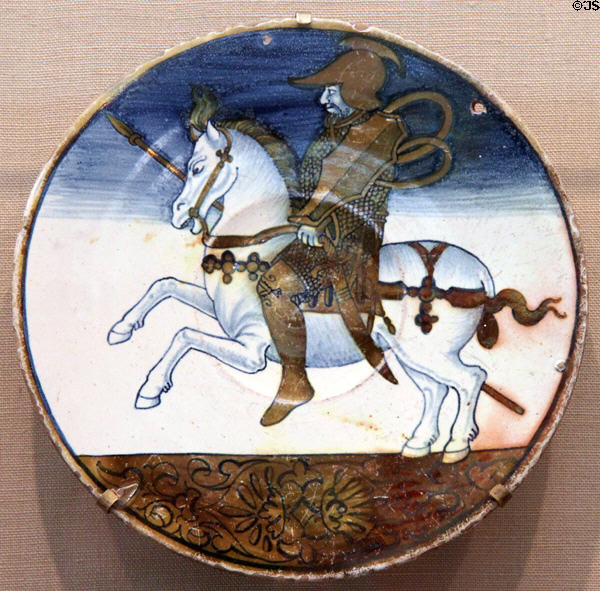 Earthenware plate with mounted knight design (c1500--50) from Deruta & Gubbio, Italy at Carnegie Museum of Art. Pittsburgh, PA.