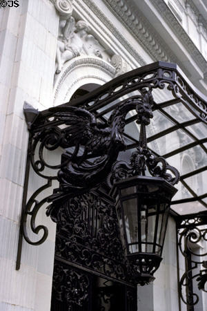Rosecliff mansion iron phoenix holds lamp over entrance. Newport, RI.