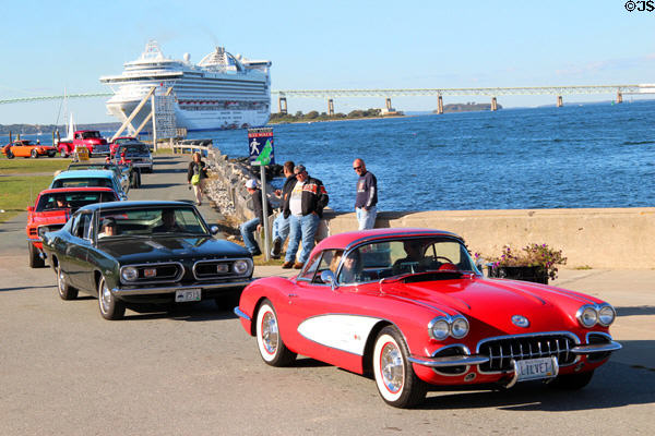 Antique car show at Fort Adams Pt State Park with cruise ship beyond. Newport, RI.