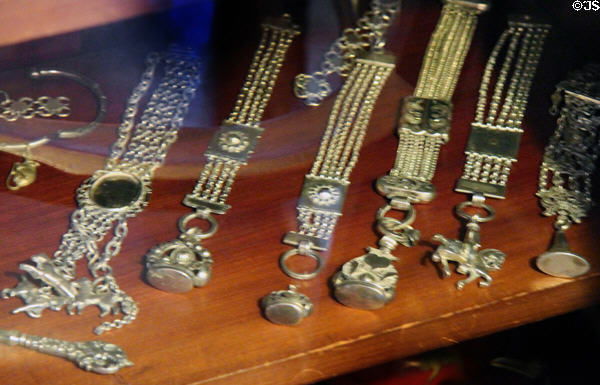 Collection of watch fobs at Kingscote. Newport, RI.