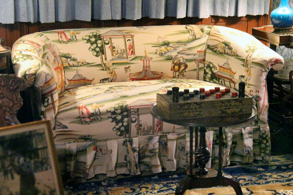 Sofa with Chinese-style covering in Library at Kingscote. Newport, RI.