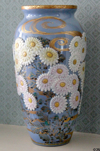 Ceramic vase with relief daisies at Kingscote. Newport, RI.
