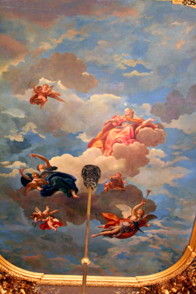 Ceiling painting shows goddess in red sitting room at Marble House. Newport, RI.
