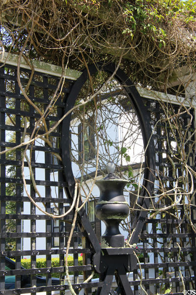 Garden screen with urn at Chepstow. Newport, RI.
