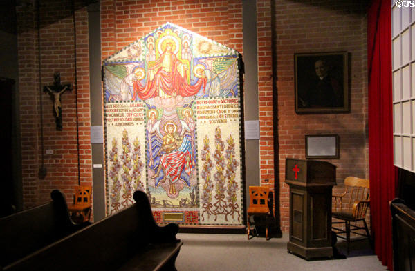 Memorial mosaic (1920s) from Our Lady of Victories Church marks World War I at Museum of Work & Culture. Woonsocket, RI.