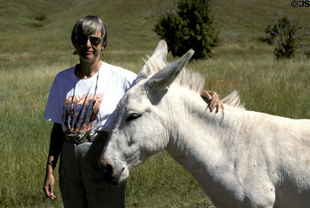 Tourist meets not so wild donkey at Custer State Park. SD.