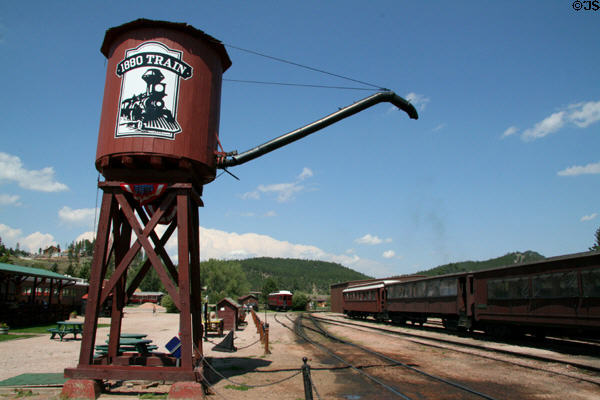 Water tower & passenger cars of 1880 Train of Black Hills Central Railroad. Hill City, SD.
