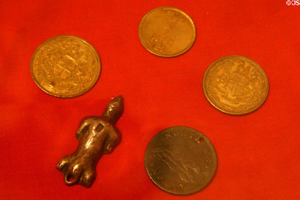 Beaver pendant, Hudson's Bay & Northwest Company trading tokens in Old Courthouse Museum. Sioux Falls, SD.