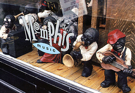 Fanciful jazz musician figures in window of Memphis Music store on Beale Street. Memphis, TN.