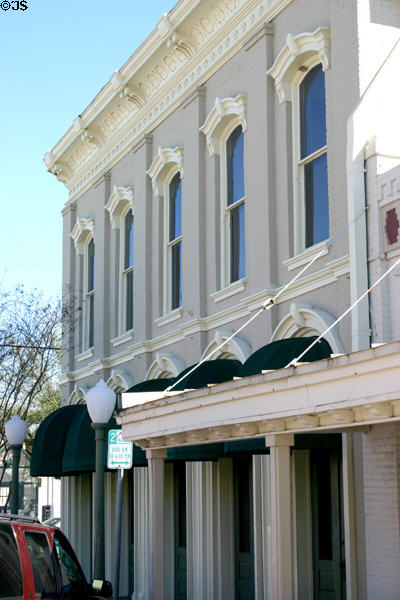Building at Main & Spring Streets. Bastrop, TX. Style: Italianate.