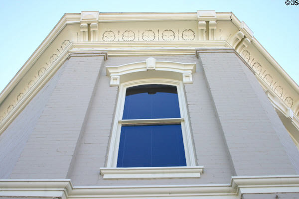 Building at Main & Spring Streets upper corner detail. Bastrop, TX. Style: Italianate.