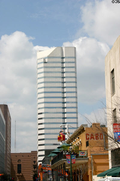 Lyric Center above heritage buildings. Houston, TX.