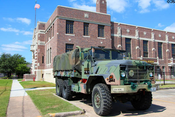 Buffalo Soldiers National Museum with antique army truck in front of former Houston Light Guard Armory (1925). Houston, TX.