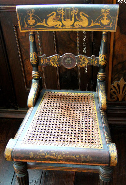 Stenciled caned side chair at Nichols-Rice-Cherry House at Sam Houston Park. Houston, TX.