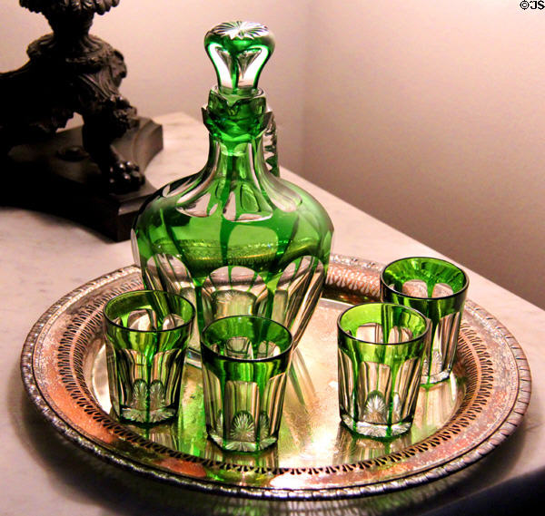 Green cut decanter with glasses on silver tray at Nichols-Rice-Cherry House at Sam Houston Park. Houston, TX.