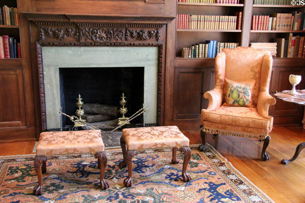 Library fireplace & armchair at Rienzi house museum. Houston, TX.