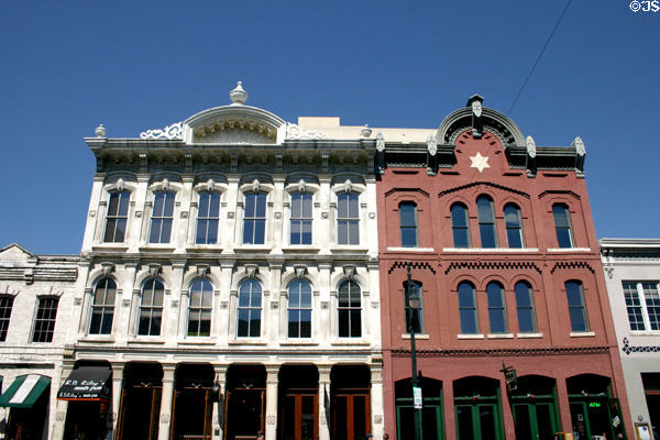 Hanning & red brick buildings at 200 & 206 East 6th St. Austin, TX.