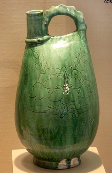 Liao dynasty earthenware green-glazed flask (907-1125) from China at San Antonio Museum of Art. San Antonio, TX.