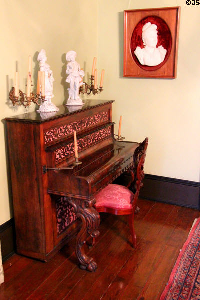 Piano with candle holders at Edward Steves Homestead Museum. San Antonio, TX.