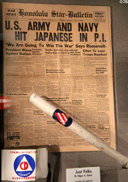 Pearl Harbor news in Honolulu Star-Bulletin (Dec. 10, 1941) & Civil Defense club & armband at National Museum of the Pacific War. Fredericksburg, TX.