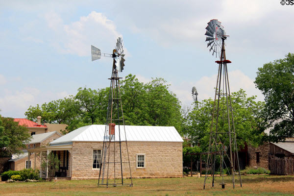 Fassel-Roeder House (c1878) beyond windmills at Pioneer Museum. Fredericksburg, TX.