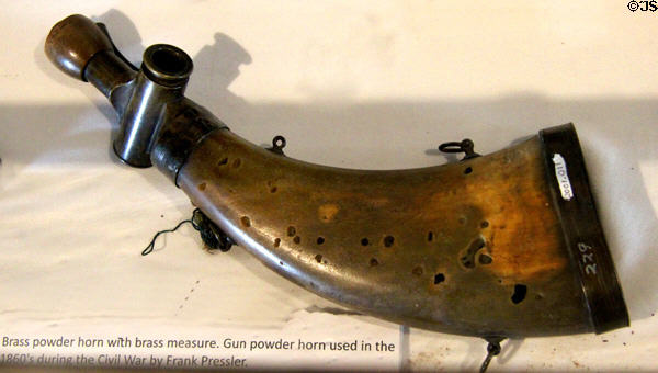 Brass powder flask with measuring valve used during Civil War at Pioneer Museum. Fredericksburg, TX.