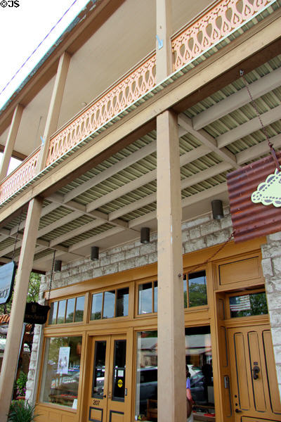 Schandua Building (1897) (207 East Main St.) with covered verandah sidewalk. Fredericksburg, TX.