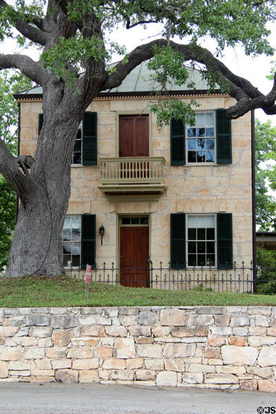 Two-story limestone heritage house (107 North Schubert St.). Fredericksburg, TX.