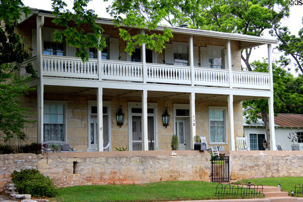 Two-story limestone heritage house (112 North Schubert St.). Fredericksburg, TX.