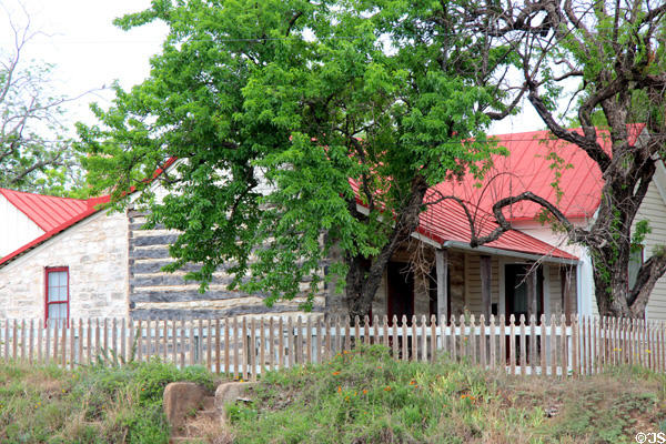 Log cabin at corner of Schubert & Llano St. Fredericksburg, TX.