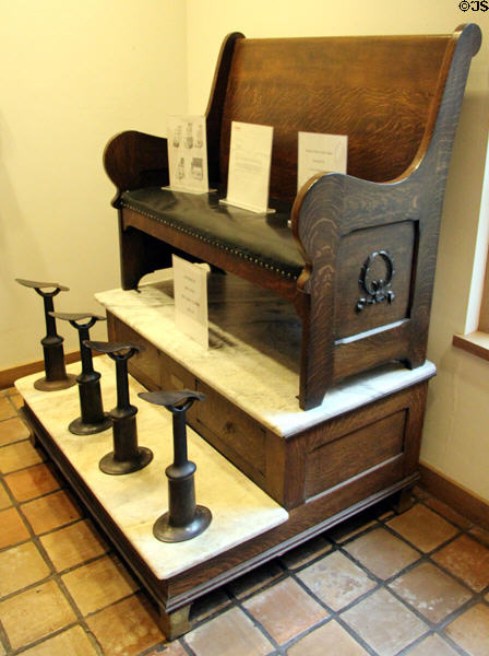 Shoe shine settee stand (c1910) at Museum of Western Art. Kerrville, TX.