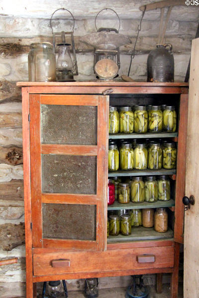Cabinet with preserves at Sauer-Beckmann Farmstead. Stonewall, TX.
