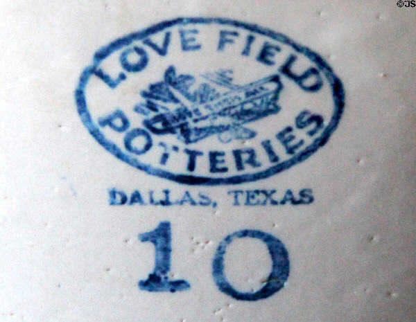 Brand stamp for Love Field Potteries (c1923-48) of Dallas, Texas with picture of biplane on stoneware crock at Sauer-Beckmann Farmstead. Stonewall, TX.
