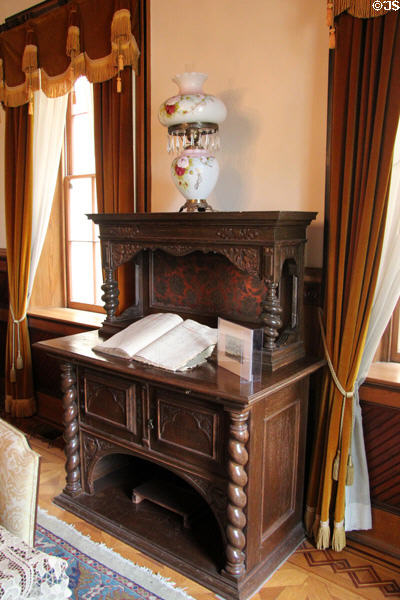 Dining room sideboard with oil lamp at Capt. Charles Schreiner Mansion. Kerrville, TX.