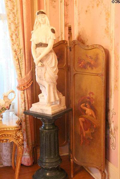 Statue & decorative screen in pink parlor at McFaddin-Ward House. Beaumont, TX.