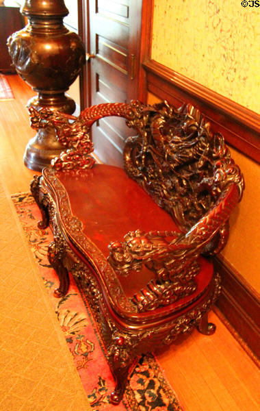 Carved Chinese bench in hall at McFaddin-Ward House. Beaumont, TX.