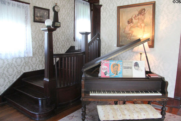 Everett baby grand piano (1922) & staircase in living room at Chambers House Museum. Beaumont, TX.