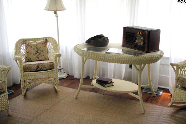 Wicker chair & table with radio sun porch at Chambers House Museum. Beaumont, TX.