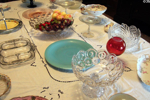 Serving pieces belonging to family on dining room table at Chambers House Museum. Beaumont, TX.