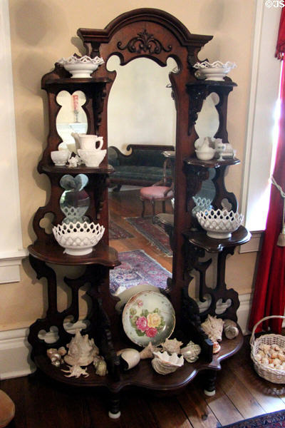 Étagère with porcelain original to house in north parlor at Earle-Napier-Kinnard House. Waco, TX.