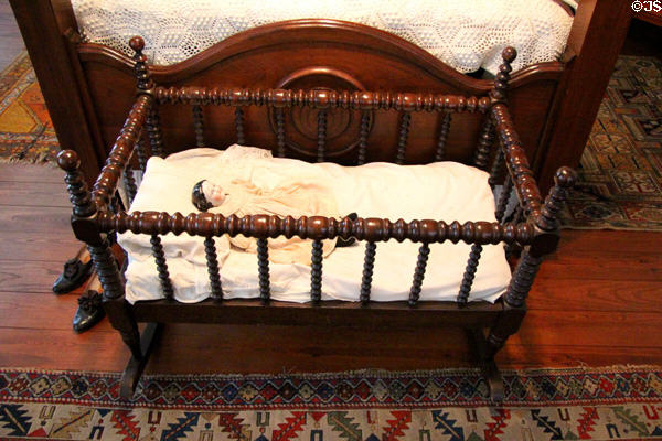 Cradle with spindle railing at Fort House. Waco, TX.
