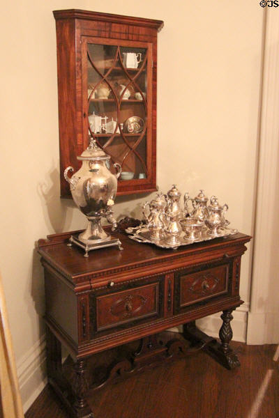 Sideboard with silver hot water urn plus coffee & tea service at McCulloch House. Waco, TX.