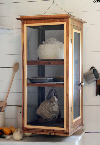 Hanging screened cabinet in Cook's House to protect food from vermin at historic village of Mayborn Museum. Waco, TX.