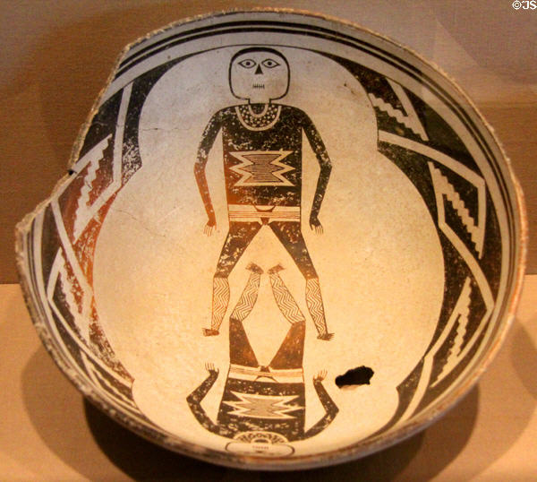 Ceramic black-on-white bowl with two human figures (c1000-1150) by Mogollon culture (Mimbres people) of NM at Dallas Museum of Art. Dallas, TX.