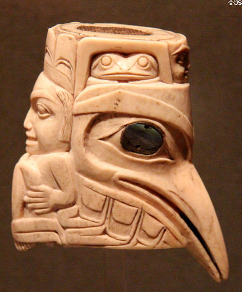 Walrus ivory carving of raven with crouching figure & masks (19thC) by Haida culture of Queen Charlotte islands (Haida Gwaii), BC at Dallas Museum of Art. Dallas, TX.