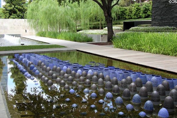 Pool with rows of sculpted ovals of Boolean Valley by Adam Silverman at Nasher Sculpture Center. Dallas, TX.