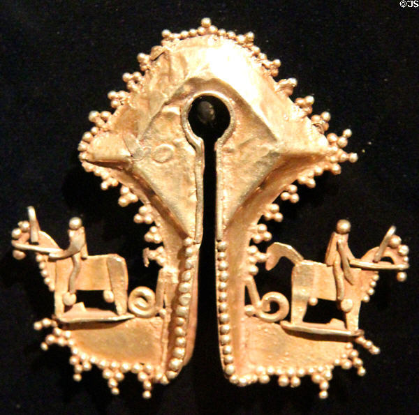 Man's gold symbolic pendant (late 19th C) from Lesser Sunda Islands, Indonesia at Dallas Museum of Art. Dallas, TX.
